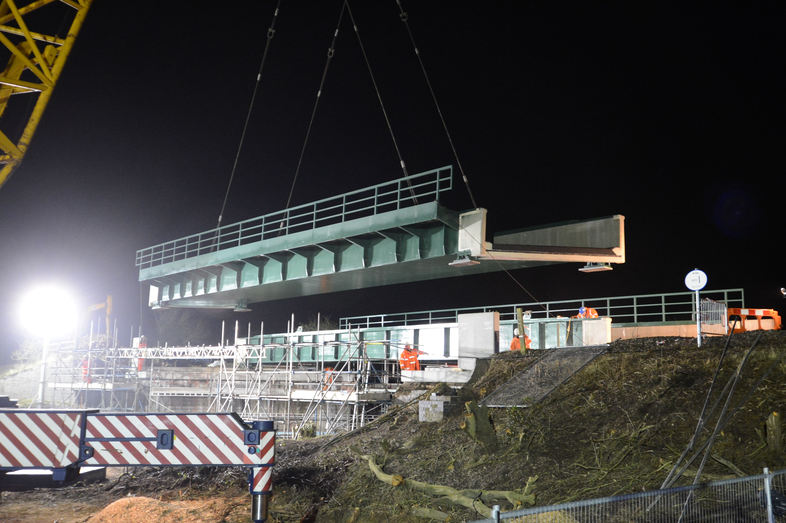 Once the old bridge had been removed & the site cleared & prepared the new bridge was lifted into place. This has been built in two sections (one for the Up line & another for the down line)