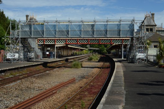 The temporary footbridge with the main station buildings beyond.