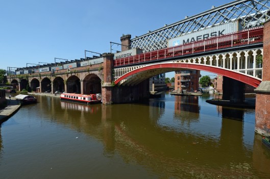 The changing face of freight traffic in Manchester. An intermodal train bound for Trafford Park passes the canals that kickstarted the industrial revolution