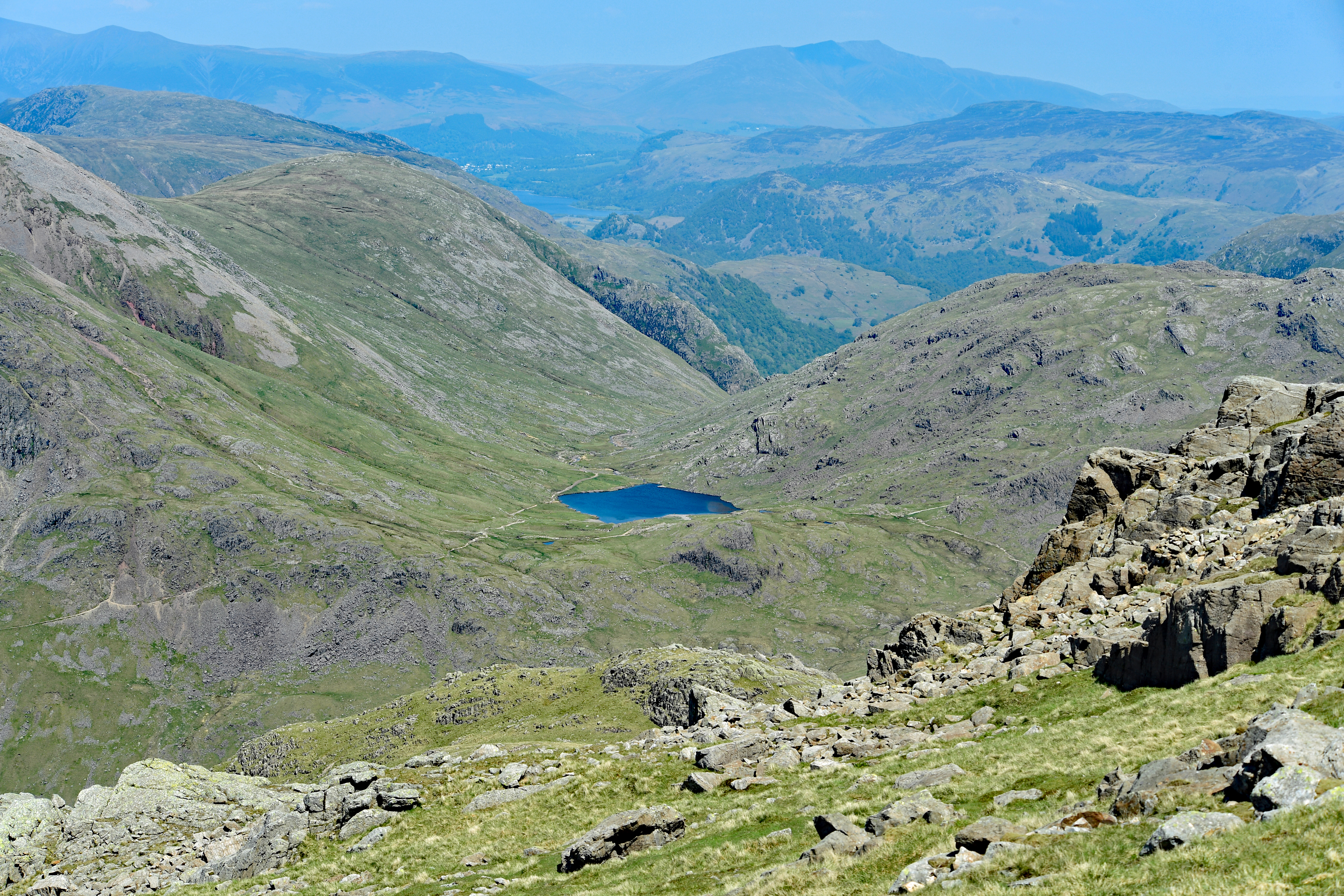 DG270989. Angle Tarn seen from the top of Scafell. Wasdale. Cumbia. England. 26.5.17