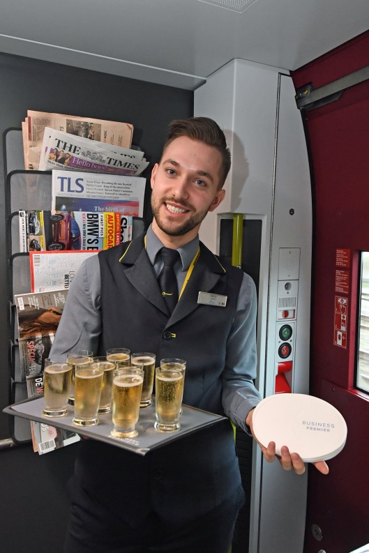 DG289823. Champagne is served. train 9114, the press trip to Amsterdam. 20.2.18
