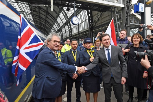 DG289889. Greeting the press special on arrival in Amsterdam Central. Holland. 20.2.18