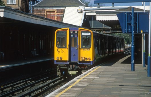 12111. 313102. Watford - Euston local. North Wembley. 04.04.03.