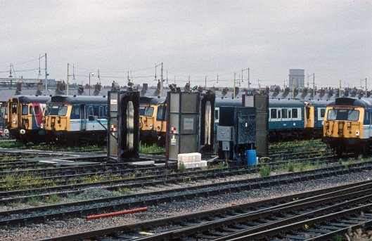 04961. 309618. 305513. 305509. 55009. Stored in the carriage sidings. Blackpool North.19.6.95crop