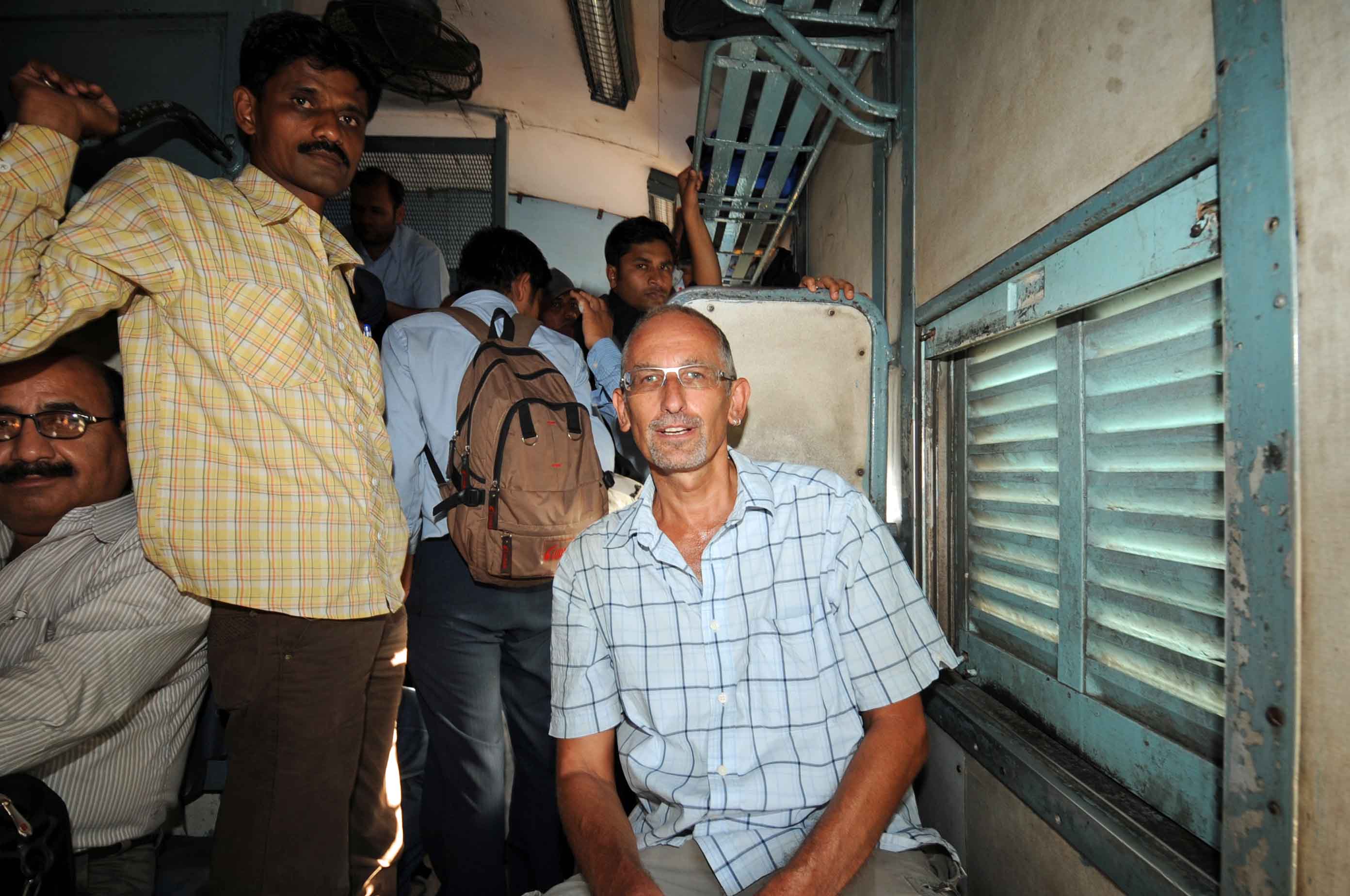 DG77491. Me on crowded train. Gujarat. India. 26.3.11crop