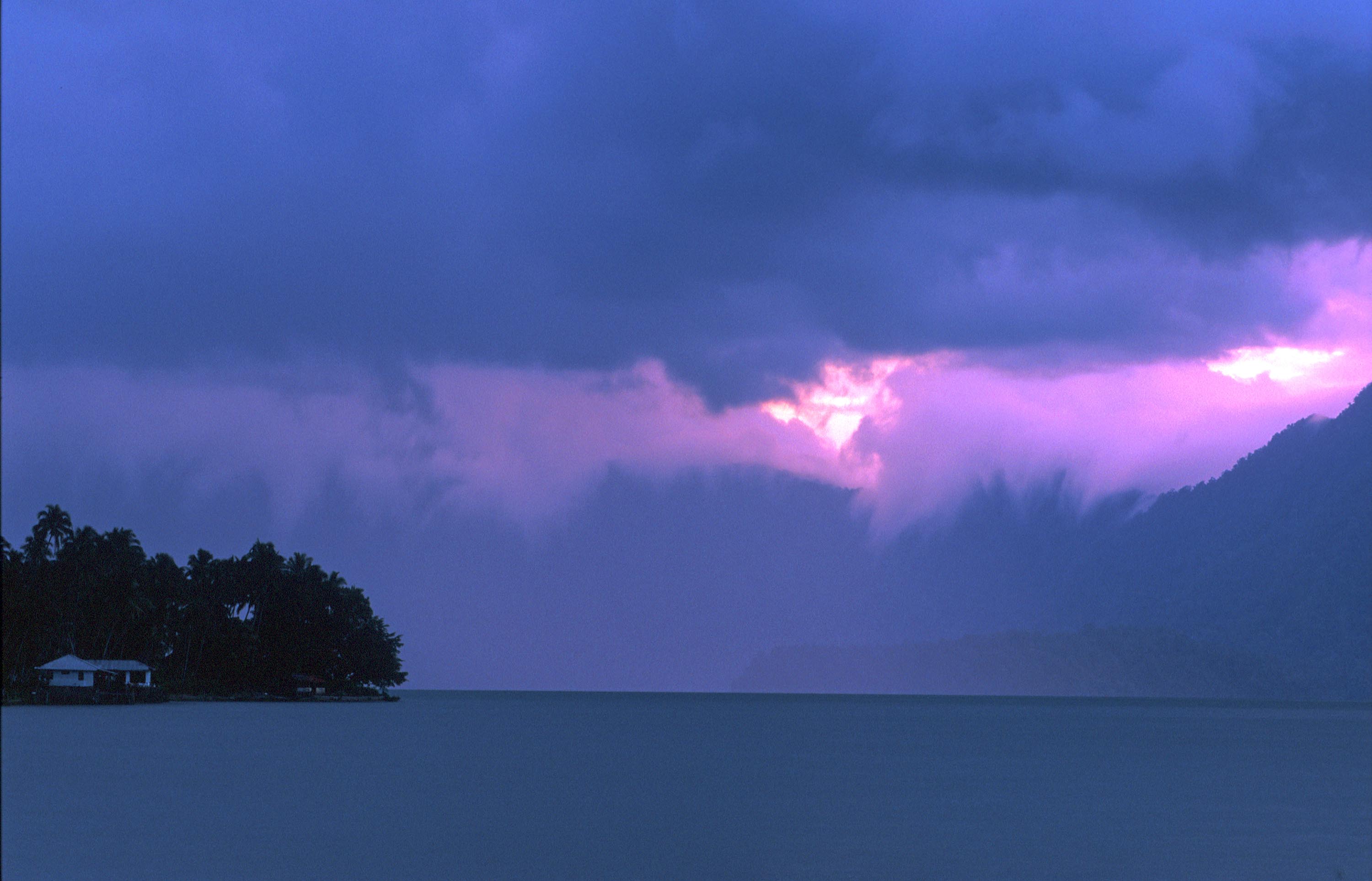T7623. Storm over Maninjau lake. Sumatra. 1992.