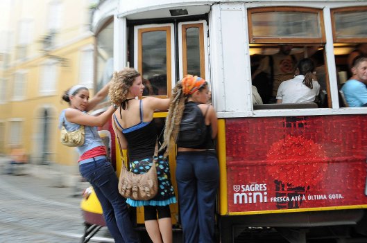 DG53199. Tram surfing. Lisbon 2.6.10.crop