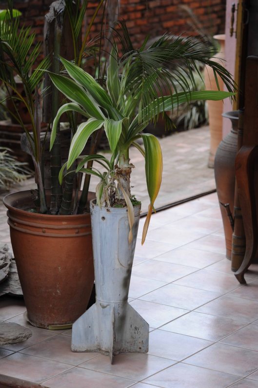 TD09205. Old bomb new use. Luang Prabang. Laos. 9.1.09.crop